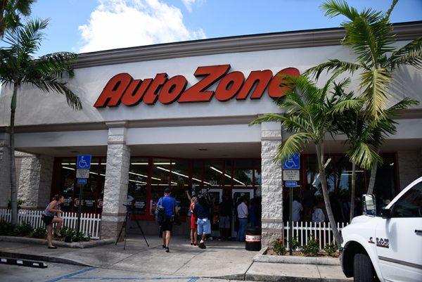 Journalists wait outside the Plantation, Florida AutoZone store where alleged package bomber Cesar Sayoc was arrested by FBI agents on Oct. 26. (Michele Eve Sandberg/AFP/Getty Images)