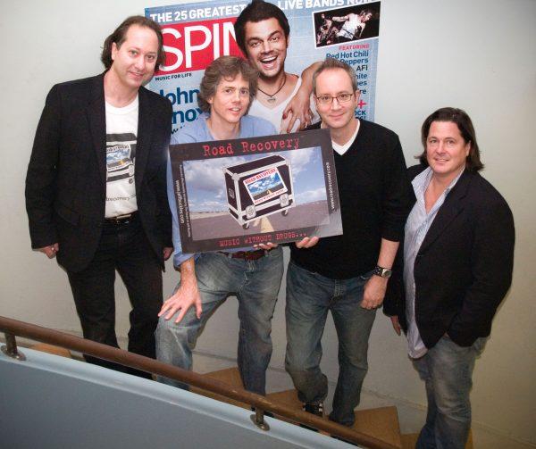 Jack Bookbinder (L) and Gene Bowen (center L) with Spin Magazine executives. (Courtesy of Jack Bookbinder)