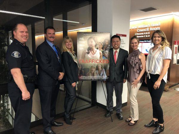 (L-R) City of Glendale Police Department Chief Carl Povilaitis; Burton Brink, Los Angeles County Sherriff Department Sergeant; Conroy Kanter, President of KK Ranch Productions, Inc.; President of Asian Industry B2B Marc Ang; Psychotherapist Deborah J. Vinall; Tracy Nielsen, Director of Care and Communications "I Am Treasure" in Glendale, Calif. on Sept. 28. (Annie Wang/The Epoch Times)