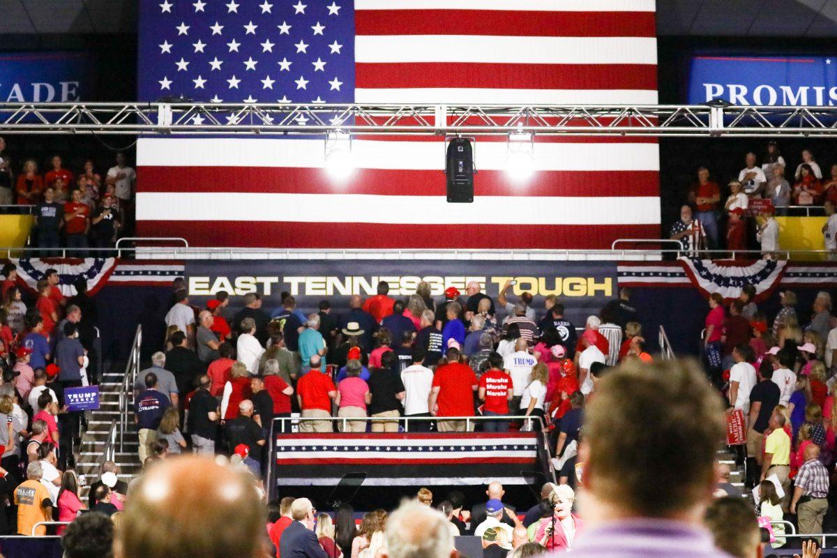 Attendees sing the national anthem at a Make America Great Again rally in Johnson City, Tenn., on Oct. 1, 2018. (Charlotte Cuthbertson/The Epoch Times)