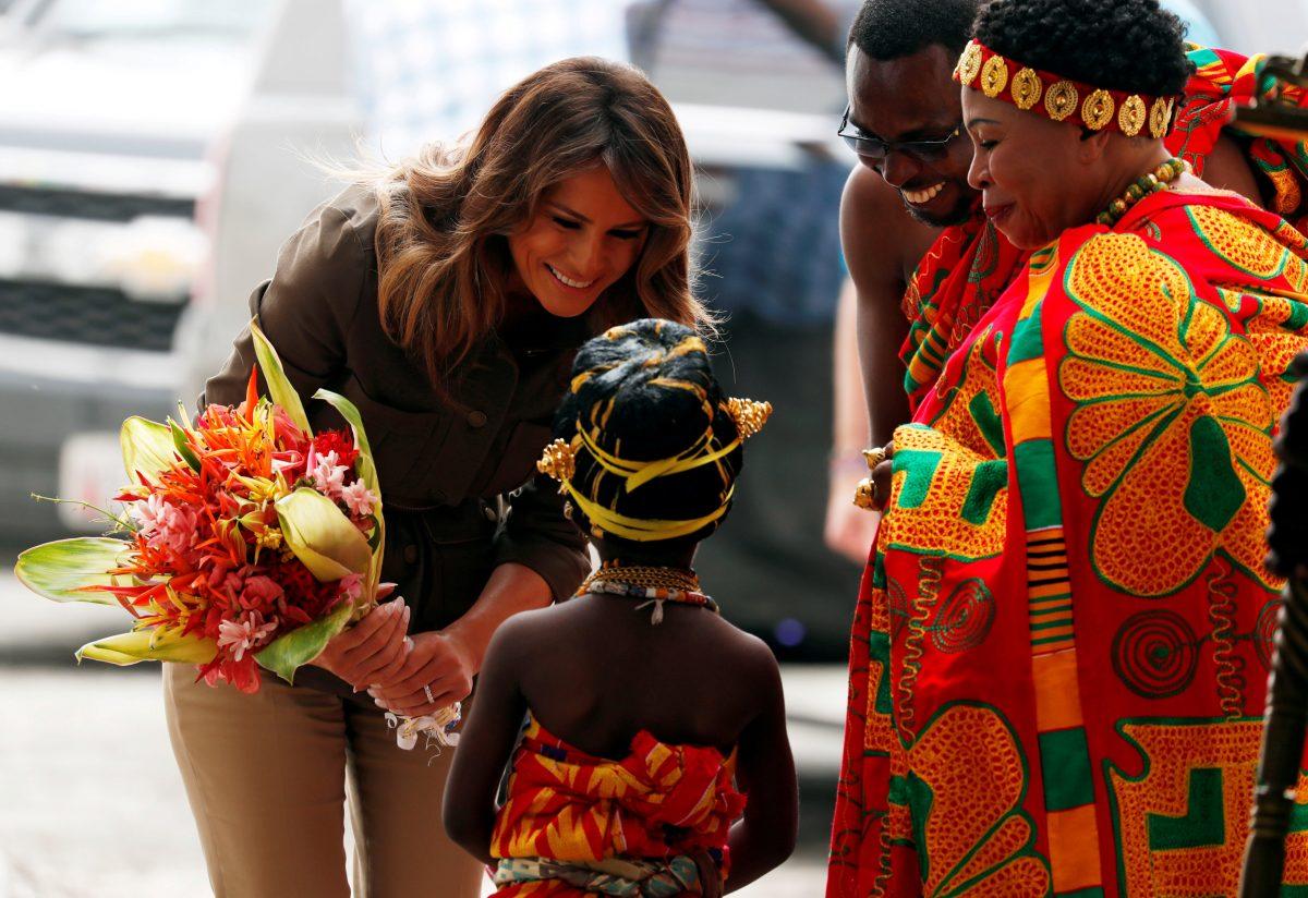 First lady Melania Trump greets a child during her visit at Cape Coast castle, Ghana, on Oct. 3, 2018. (Carlo Allegri/Reuters)