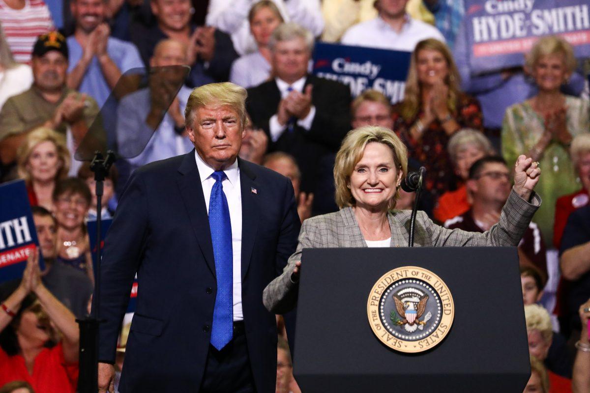 President Donald Trump and Sen. Cindy Hyde Smith (R-Miss.) at a Make America Great Again rally in Southaven, Miss., on Oct. 2, 2018. (Charlotte Cuthbertson/The Epoch Times)