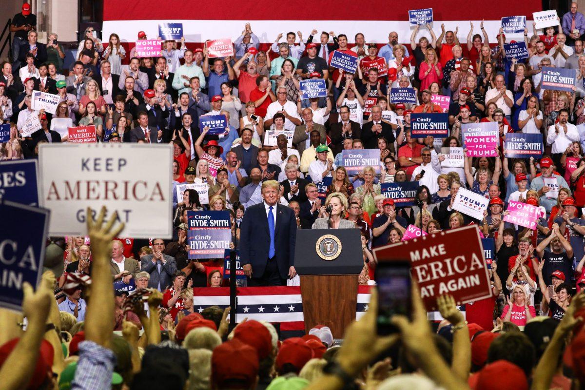 President Donald Trump and Sen. Cindy Hyde Smith (R-Miss.) at a Make America Great Again rally in Southaven, Miss., on Oct. 2, 2018. (Charlotte Cuthbertson/The Epoch Times)