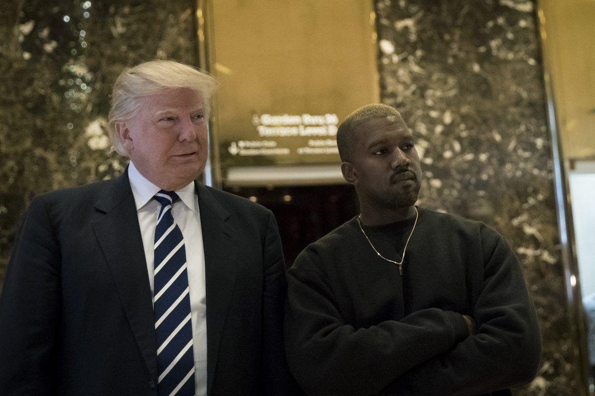 President-elect Donald Trump and Kanye West stand together in the lobby at Trump Tower in New York City on Dec. 13, 2016 in New York City. (Drew Angerer/Getty Images)