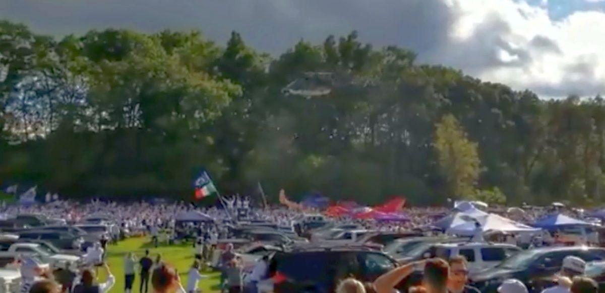 A Penn State University tailgate party was buzzed by a helicopter, sending debris flying everywhere, and it was captured on video. (CNN)