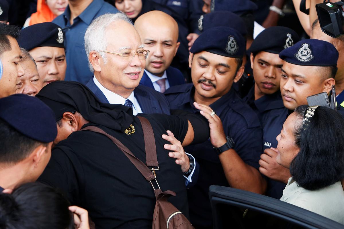 Malaysia's former Prime Minister Najib Razak leaves a court in Kuala Lumpur, Malaysia October 4, 2018. (Lai Seng Sin/Reuters)