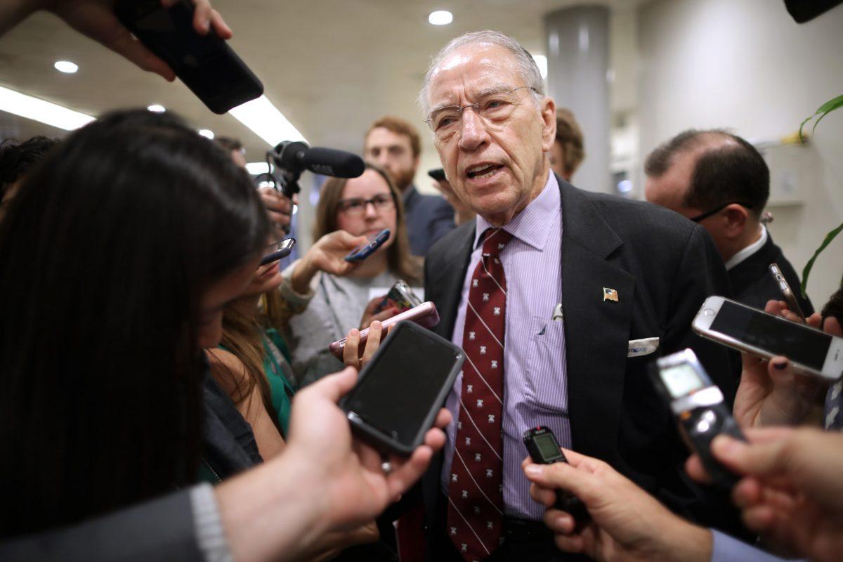 Senate Judiciary Committee Chairman Chuck Grassley (R-IA) talks with reporters as he heads for a meeting at the U.S. Capitol in Washington on Oct. 2, 2018. (Chip Somodevilla/Getty Images)