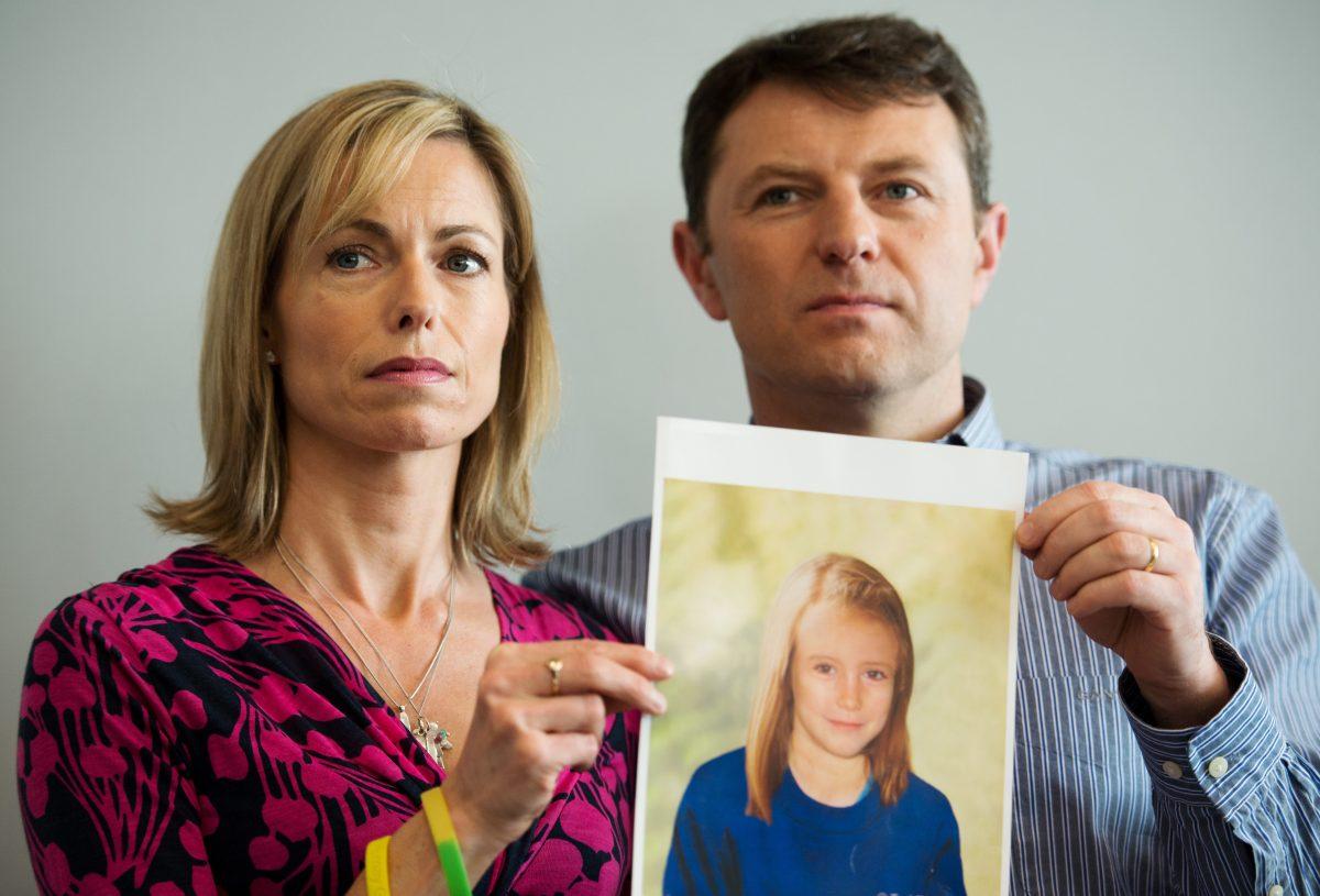 Kate and Gerry McCann pose with an artist's impression of how their daughter might look at 9 in London on May 2, 2012. (AFP/Getty Images)