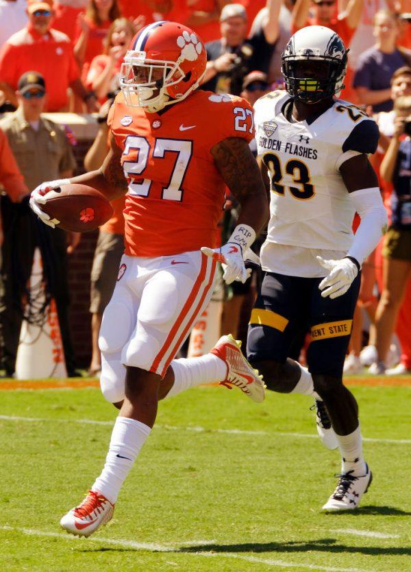 CJ Fuller #27 makes his way into the end zone ahead of cornerback Jerrell Foster #23 of the Kent State Golden Flashes at Memorial Stadium in Clemson, South Carolina, on Sept. 2, 2017. (Todd Bennett/Getty Images)