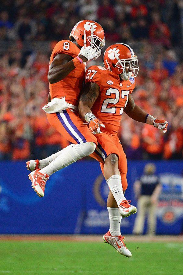 Deon Cain #8 of the Clemson Tigers and C.J. Fuller #27 react during the first half of the 2016 PlayStation Fiesta Bowl at the University of Phoenix Stadium in Glendale, Arizona, on Dec. 31, 2016. (Jennifer Stewart/Getty Images)