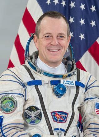 Flight engineer Ricky Arnold of NASA, who during recent spacewalks participated in replacing components of the space station’s cooling system and communications network, and installed new wireless communication antennas for external experiments. (NASA)