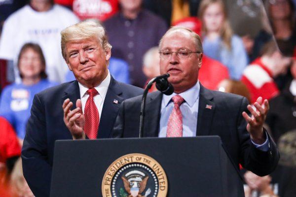 President Donald Trump and GOP congressional candidate Jim Hagedorn at a Make America Great Again rally in Rochester, Minn., on Oct. 4, 2018. (Charlotte Cuthbertson/The Epoch Times)