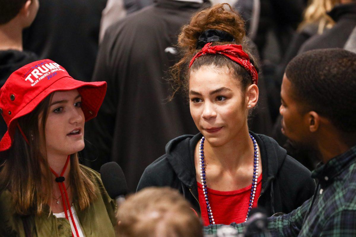 Attendees at a Make America Great Again rally in Rochester, Minn., on Oct. 4, 2018. (Charlotte Cuthbertson/The Epoch Times)