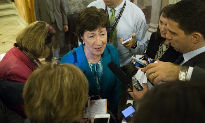Sen. Susan Collins, R-Maine speaks to reporters on Capitol Hill in Washington, on June 23, 2016. (AP Photo/Evan Vucci)