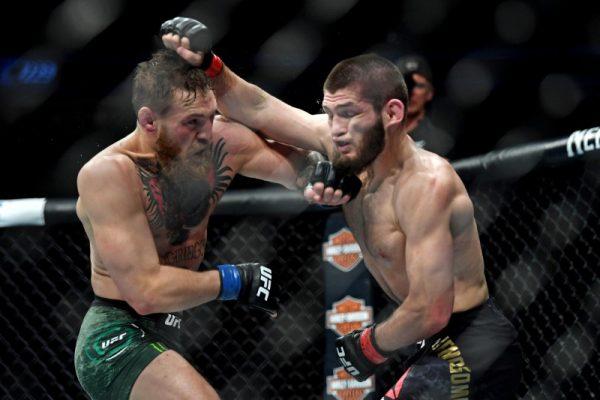 Khabib Nurmagomedov (red gloves) fights Conor McGregor (blue gloves) during UFC 229 in Las Vegas on Oct. 6, 2018. (Stephen R. Sylvanie-USA Today Sports)