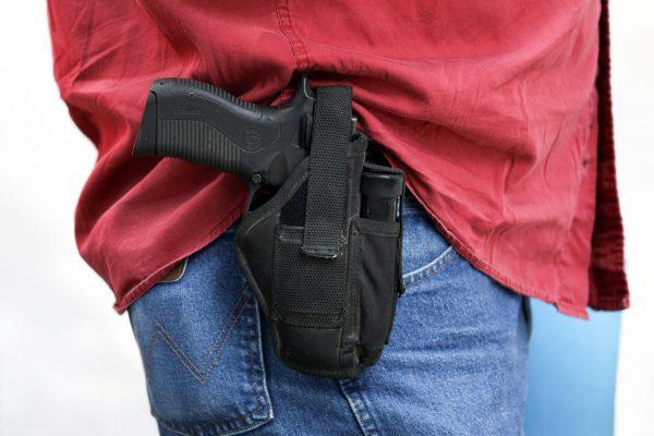 A man openly carries a gun in a file photograph. (Loren Elliott/Reuters)