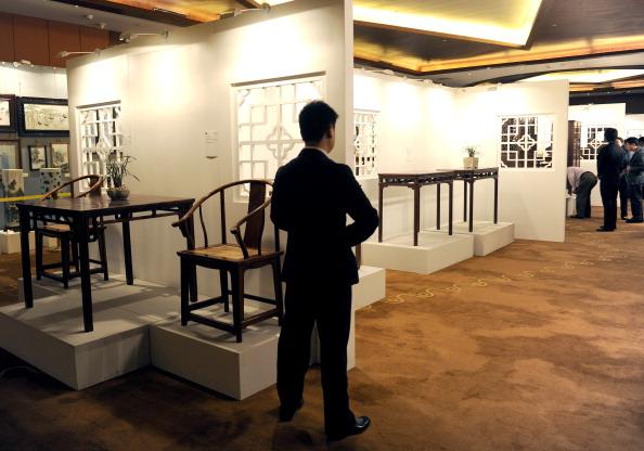 Huanghuali wood furniture is displayed ahead of the China Guardian Spring Auction in Beijing on May 19, 2011. Huanghuali is a rare species of rosewood. (Liu Jin/AFP/Getty Images)