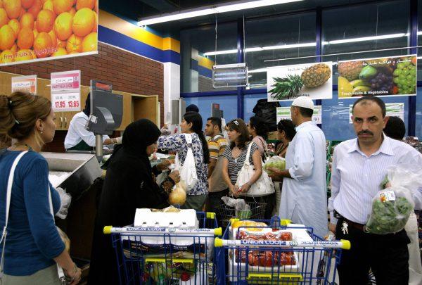 Emiratis and foreigners shop at a supermarket in Dubai in this file photo. (Marwan Naamani/AFP/Getty Images)