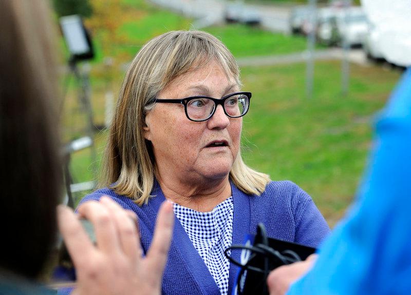 Barbara Douglas of Dannemora, N.Y., talks to reporters about her four family members that died in a fatal limousine crash killing 20 people on Route 30 and 30 A on Oct. 6, 2018, as seen Oct. 7, 2018, in Schoharie, N.Y. (AP Photo/Hans Pennink)