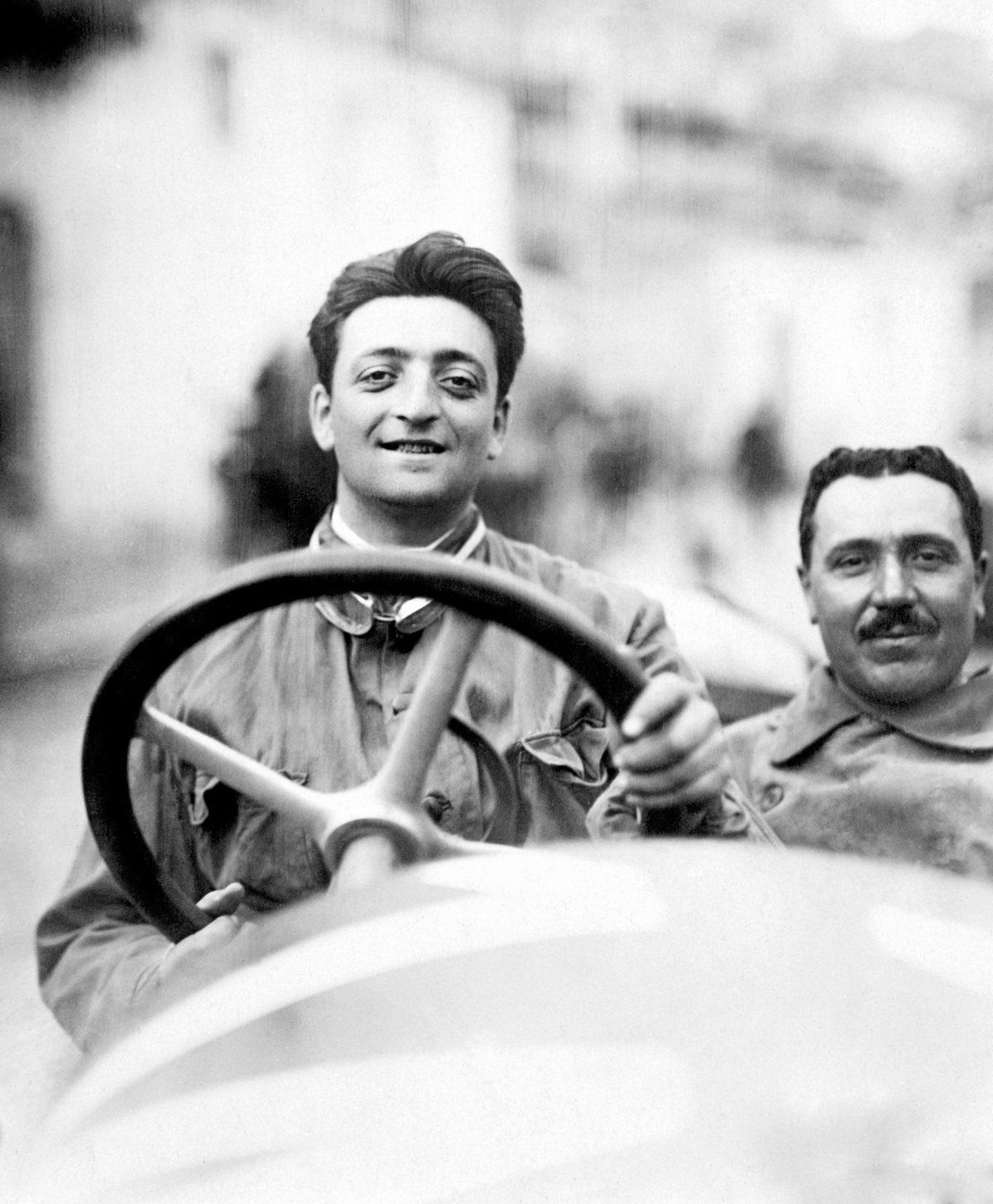 Enzo Ferrari (L) in 1920, at the Targa Florio, Ferrari's first race with Alfa Romeo. (Ferrari S.p.A./ Photo Strazza)