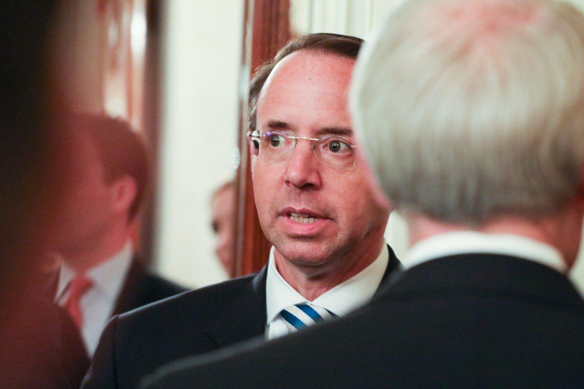 Deputy Attorney General Rod Rosenstein attends the swearing-in ceremony for Brett Kavanaugh as associate justice of the Supreme Court at the White House in Washington on Oct. 8, 2018. (Holly Kellum/The Epoch Times)