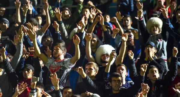 Fans of Nurmagomedov cheer him on during a meeting at the Anzhi Arena stadium in Makhachkala, Dagestan, on Oct. 8, 2018. (Vasily Maximov/AFP/Getty Images)