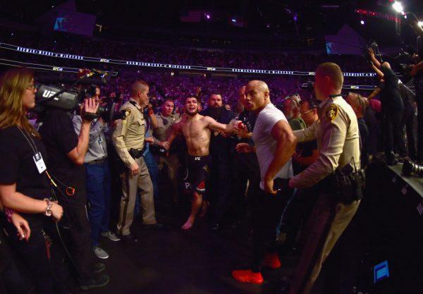 Khabib Nurmagomedov is escorted out of the arena after defeating Conor McGregor in their UFC lightweight championship bout by way of submission during the UFC 229 event inside T-Mobile Arena on Oct. 6, 2018 in Las Vegas, Nevada. (Harry How/Getty Images)