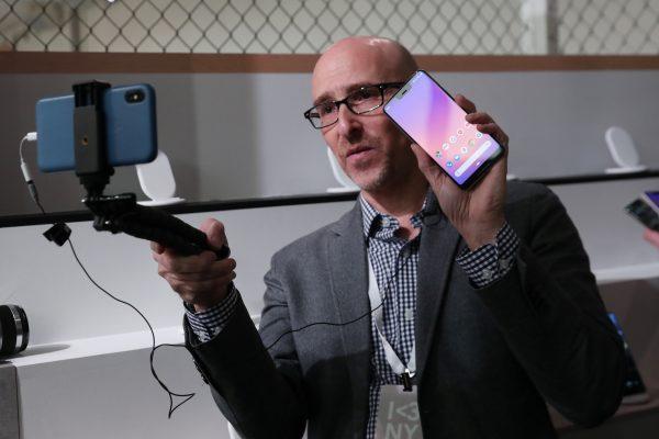 A man takes a video of the Google Pixel 3 third generation smartphone after a news conference in Manhattan, New York, on Oct. 9, 2018. (Shannon Stapleton/Reuters)