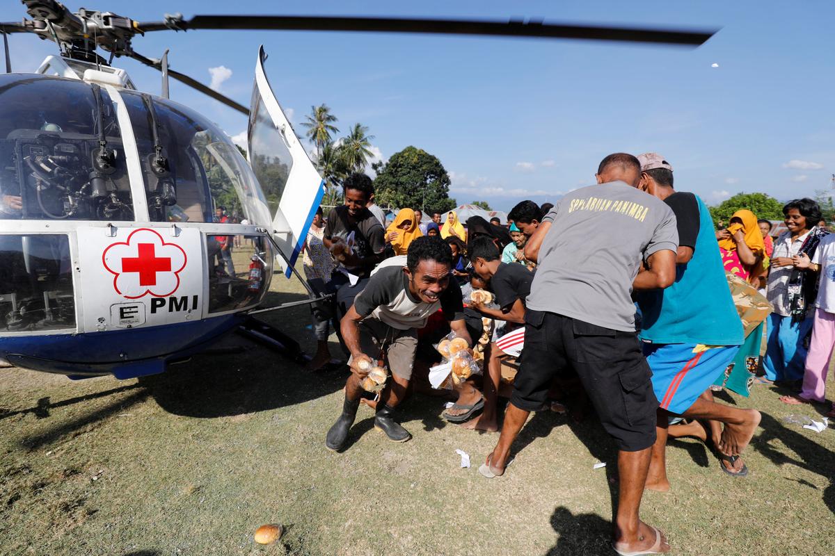 Indonesians Step up Search for Quake Victims to Beat Deadline as Toll Exceeds 2,000
