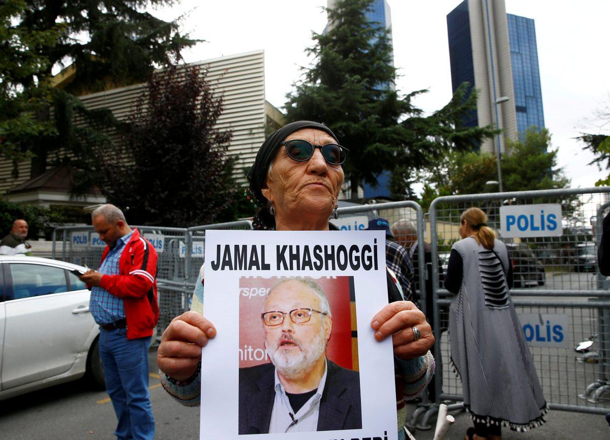 A human rights activist holds picture of Saudi journalist Jamal Khashoggi during a protest outside the Saudi Consulate in Istanbul, Turkey, on Oct. 9, 2018. (Osman Orsal/Reuters)