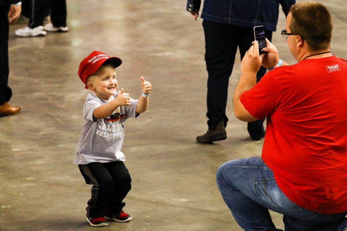 Attendees at a Make America Great Again rally in Council Bluffs, Iowa, on Oct. 9, 2018. (Charlotte Cuthbertson/The Epoch Times)