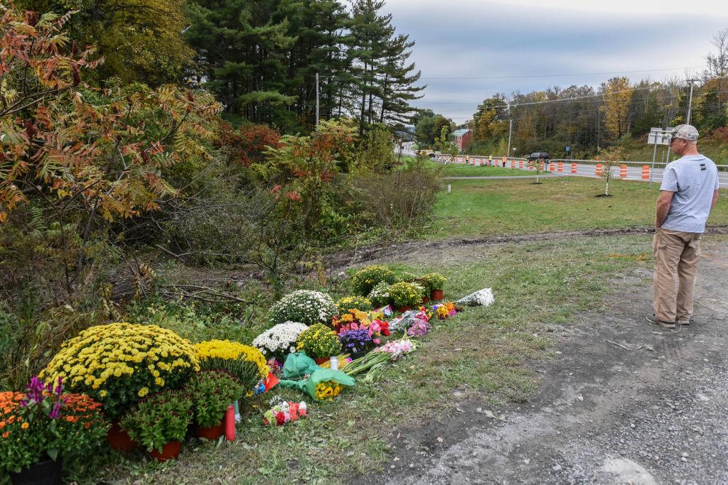 A mourner looks on at the site of the fatal limousine crash in Schoharie, N.Y., on Oct. 8, 2018. (Stephanie Keith/Getty Images)