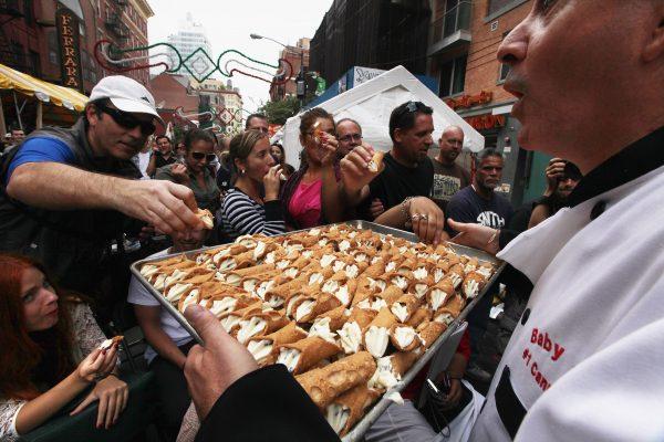 Connolis being served during the Feast of San Gennaro. (Mario Tama/Getty Images)