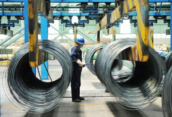 A worker handling steel cable at a steel factory in Qingdao in China's eastern Shandong Province, China, on June 8, 2018. (AFP/Getty Images)