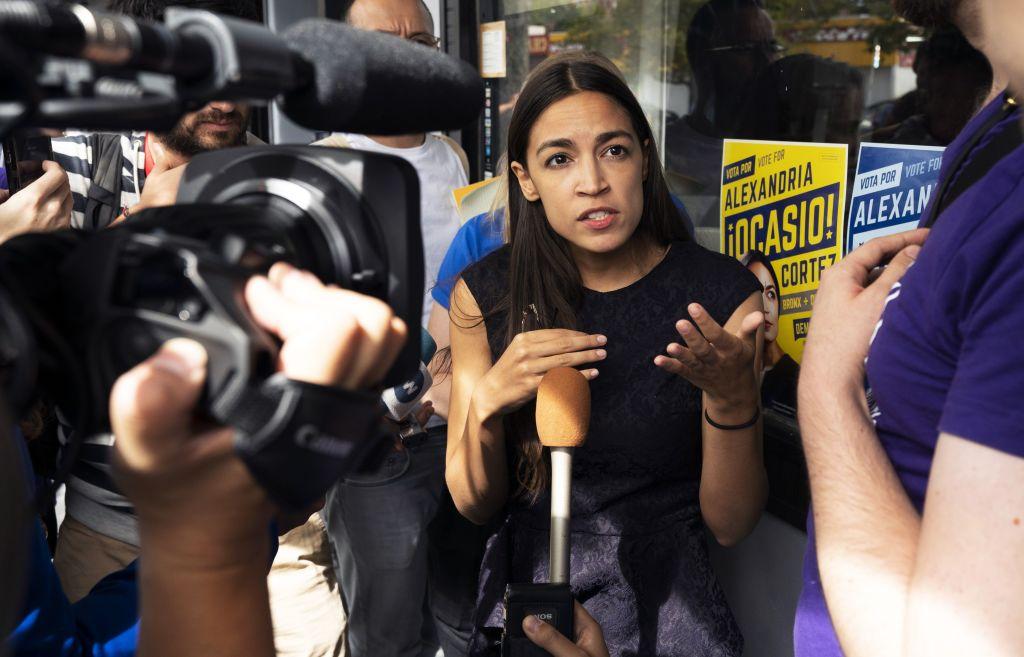 Democratic congressional candidate Alexandria Ocasio-Cortez speaks with reporters after her general campaign kick-off rally in the Bronx borough of New York on Sept. 22, 2018. (Don Emmert/AFP/Getty Images)