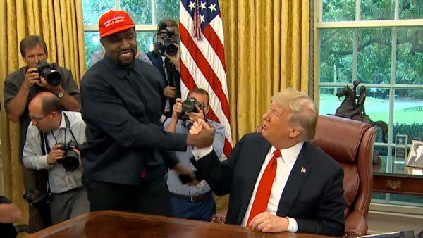 President Donald Trump meets rapper Kanye West during a meeting in the Oval office of the White House in Washington on Oct. 11, 2018. (Screenshot/AP)