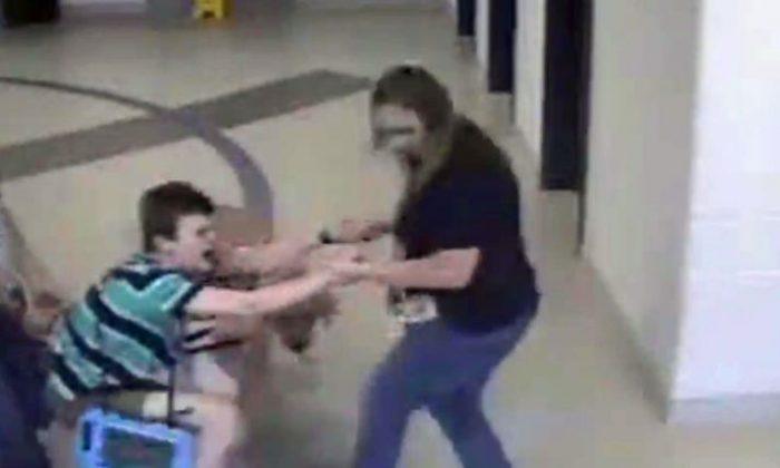 Child With Autism Seen Being Dragged Through School, Video Shows