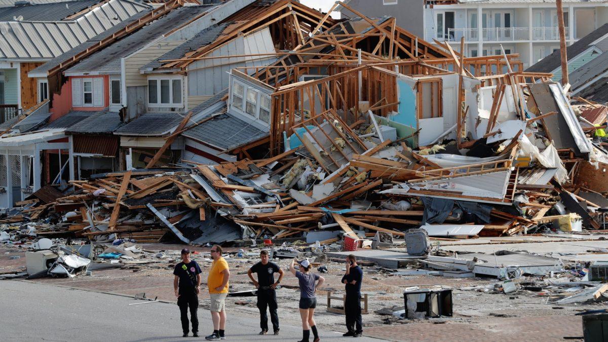 Rescue personnel perform a search in the aftermath of Hurricane Michael in Mexico Beach, Fla., on Oct. 11, 2018. (Gerald Herbert/AP)