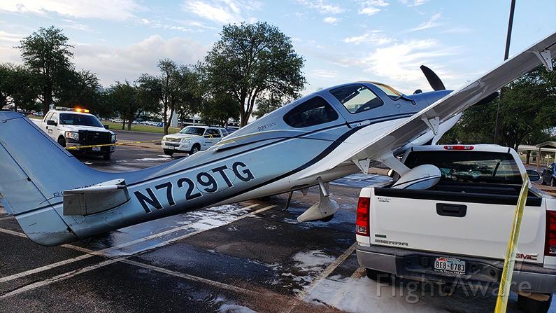 This light plane crash-landed on a pickup truck in an office complex parking lot in Midland, Texas. (Beau Rolfe/Courtesy of FlightAware)(Beau Rolfe/Courtesy of FlightAware)