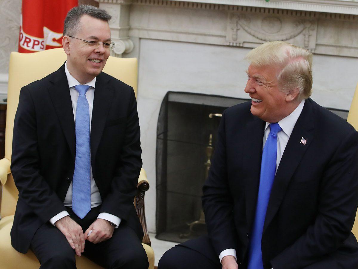 President Donald Trump welcomes American evangelical Christian preacher Andrew Brunson (L) to the Oval Office a day after Brunson was released from a Turkish jail, at the White House on Oct. 13, 2018. (Mark Wilson/Getty Images)
