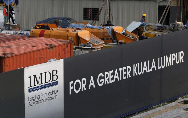 Workmen on site at the 1 Malaysia Development Berhad (1MDB) flagship Tun Razak Exchange development in Kuala Lumpur, Malaysia on March 1, 2015. (Olivia Harris/Reuters)