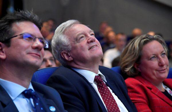 Conservative MP David Davis, along with other delegates, listens to Boris Johnson speaking at a Conservative Home fringe meeting on the third day of the Conservative Party Conference in Birmingham, Britain, on Oct. 2, 2018. (Toby Melville/Reuters)