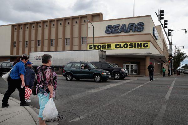 A sign announcing the store will be closing hangs above a Sears store in Chicago on Aug. 24, 2017. Scott Olson/Getty Images