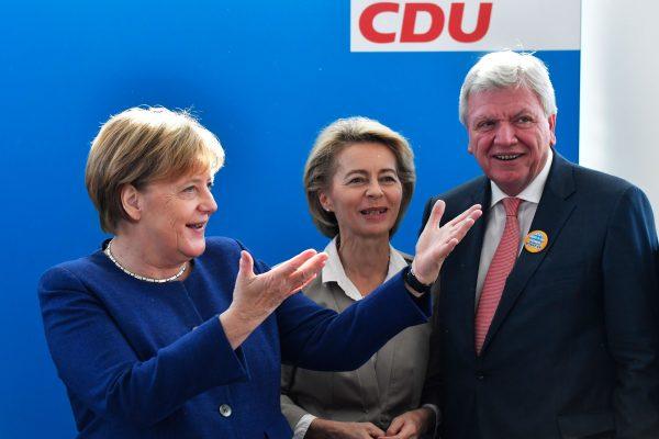 (L-R) German Chancellor and leader of the Christian Democratic Union Angela Merkel, German Defense Minister and Deputy Chairwoman of the CDU Ursula von der Leyen and Hesse's State Premier and Deputy Chairman of the CDU Volker Bouffier at their headquarters in Berlin on Oct. 15, 2018. (John MacDougall/AFP/Getty Images)