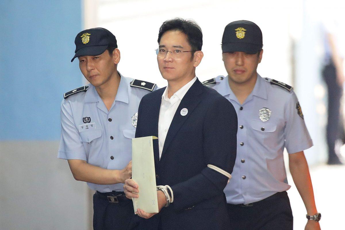Lee Jae-yong, Samsung Group heir, arrives at Seoul Central District Court to hear the bribery scandal verdict in Seoul, South Korea, on Aug. 25, 2017. (Chung Sung-jun/Getty Images)