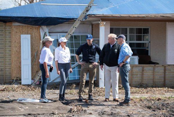 President Donald Trump, First Lady Melania Trump (2nd L) and Florida Governor Rick Scott(R) tour damage from Hurricane Michael in Lynn Haven, Florida, Oct. 15, 2018. (SAUL LOEB/AFP/Getty Images)