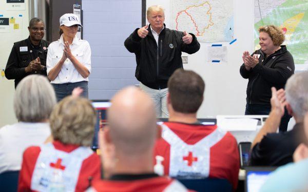 President Donald Trump and First Lady Melania Trump meet with Red Cross workers in Macon, Georgia, Oct. 15, 2018. (SAUL LOEB/AFP/Getty Images)