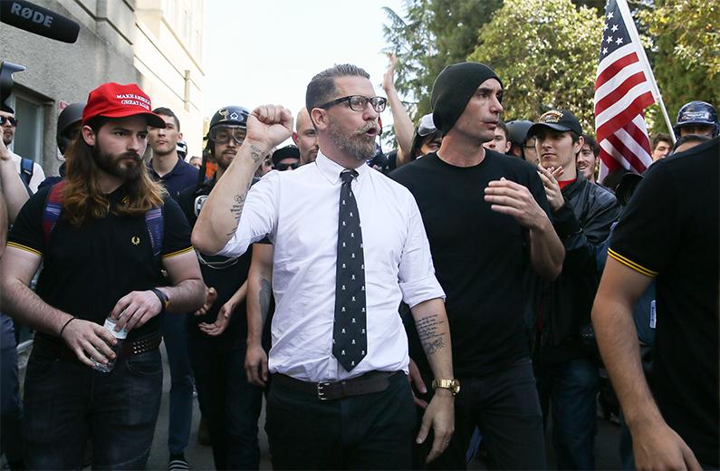 Vice co-founder and Proud Boys founder Gavin McInnes (C) pumps his fist during a rally at Martin Luther King Jr. Civic Center Park in Berkeley, Calif., on April 27, 2017. (Elijah Nouvelage/Getty Images)