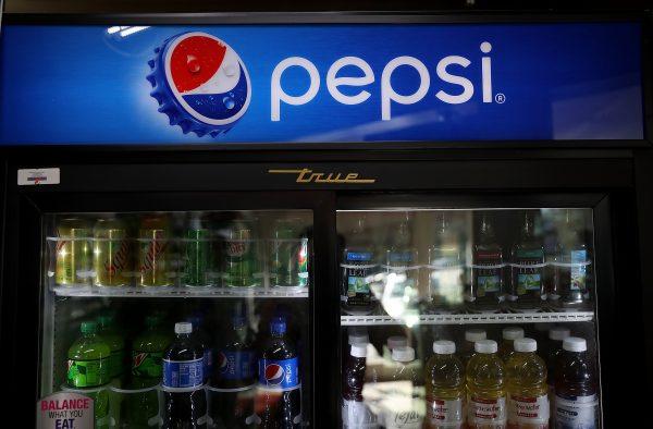 Bottles of Pepsi are displayed on a shelf at a convenience store in San Anselmo, California, on Feb. 13, 2018. (Justin Sullivan/Getty Images)
