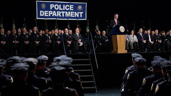 New York City Mayor Bill de Blasio speaks to the newest members of the New York City Police Department at their police academy graduation ceremony at the Theater at Madison Square Garden, October 15, 2018. (Drew Angerer/Getty Images)